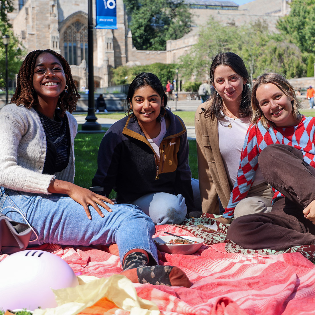 Students on Campus sitting outside